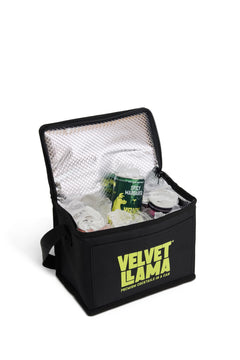 Velvet Llama cooler bag with Spicy Margarita cans on ice