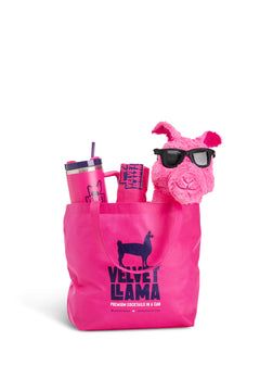 Velvet Llama tote filled with cans and merch, angle
